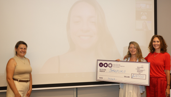 The founder of Yaku Pura, Sofaer Global MBA alumna, remotely receiving the prize in the 2026 Sofaer Pitch Competition