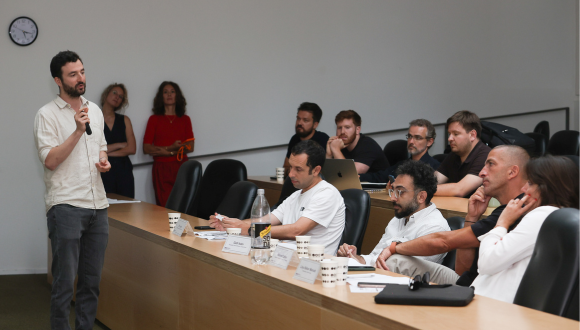 Sofaer Global MBA alum pitching his venture to the Sofaer Pitch Competition jury at Tel Aviv University
