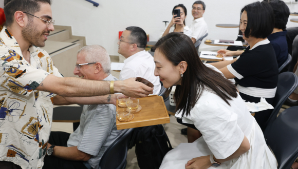 TAU student conducting a tea ceremony during the Chinese Bridge competition at Tel Aviv University
